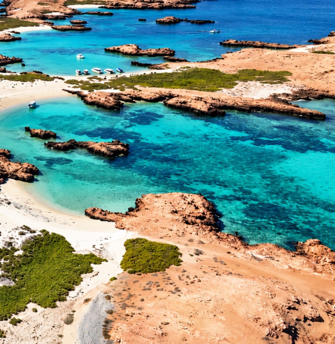 Aerial view of the Daymaniyat Islands with white-sand spits and turquoise bays off Muscat