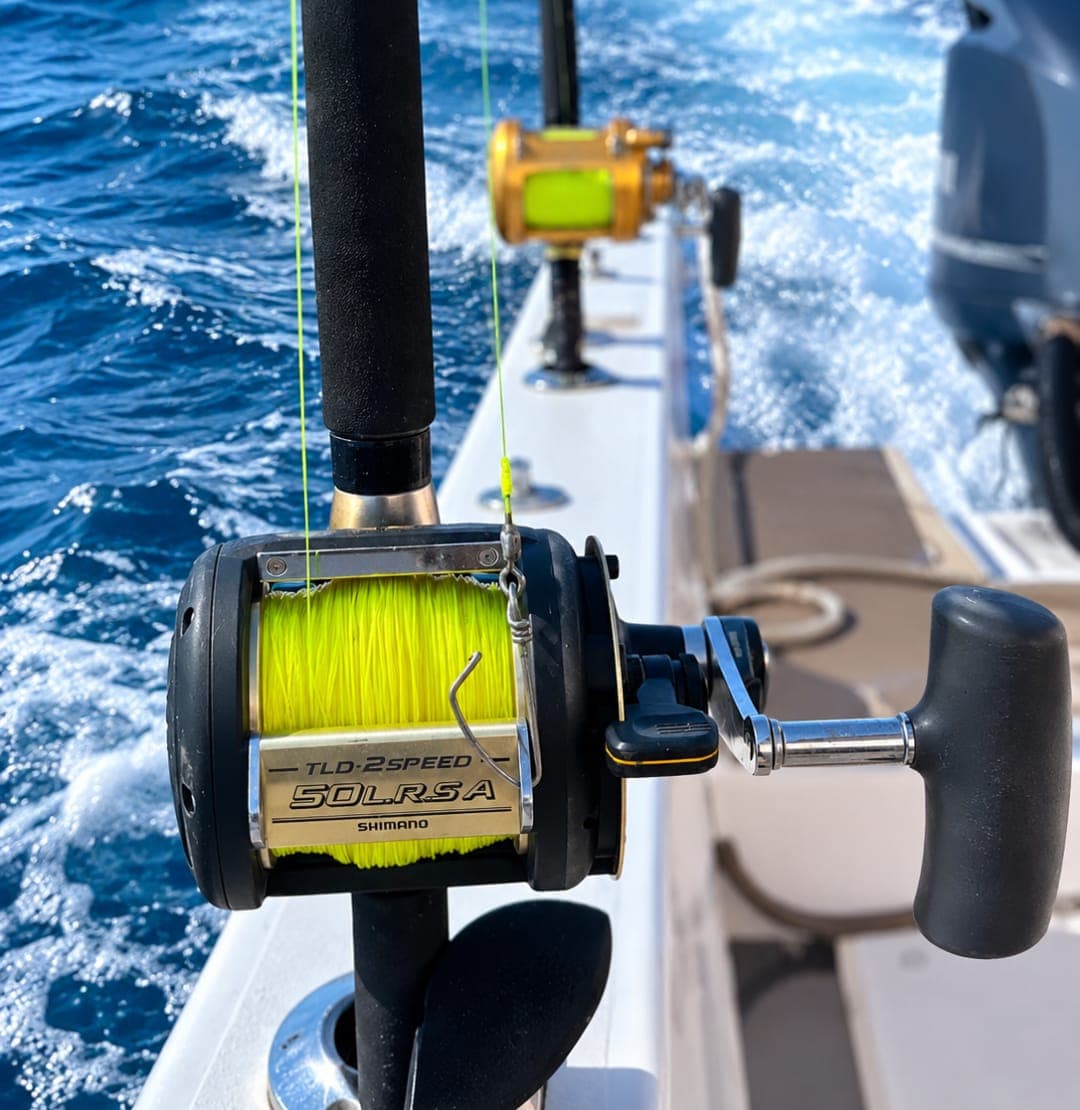 A trolling reel and rod on a Royal Marine Tours fishing trip off the Muscat coast